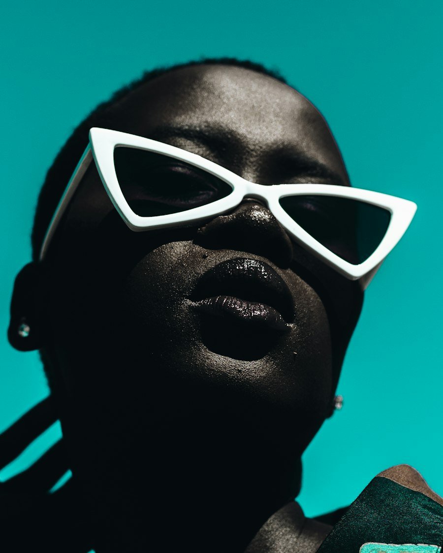 Woman wearing white frame sunglasses