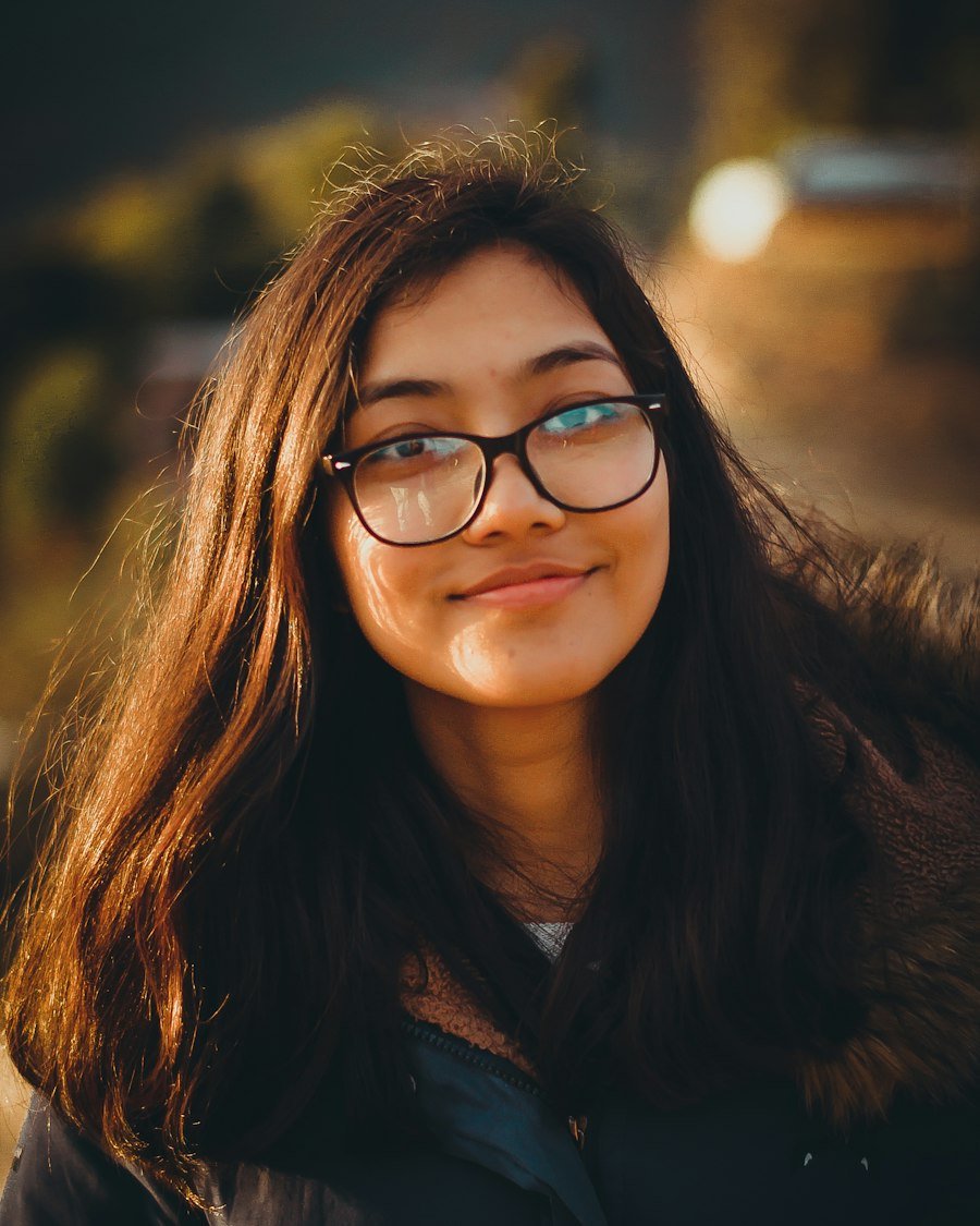 Woman wearing black frame glasses